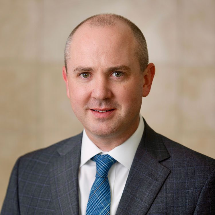 Brett Bieber smiling for a profile photo