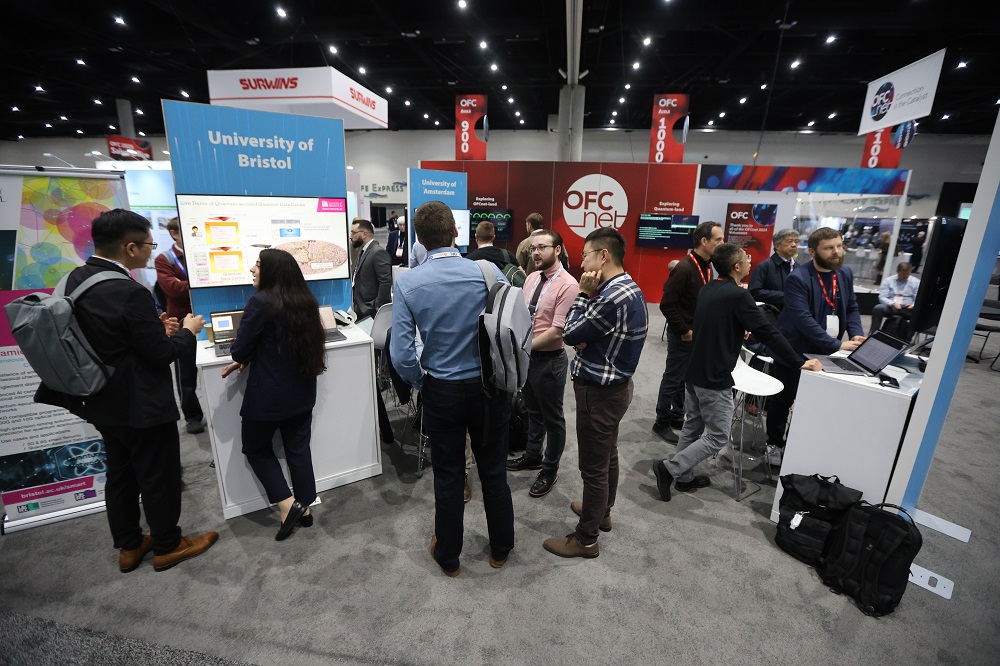 Professionals networking at the OFC net event.